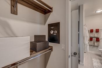 Lux Apartments Bellevue WA walk-in closet in the bathroom includes a built-in wall safe in all homes